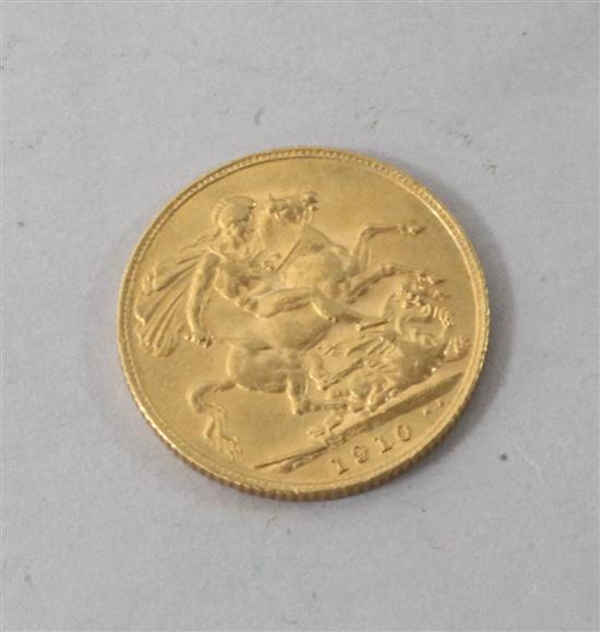 An Edward VII 1910 gold sovereign.